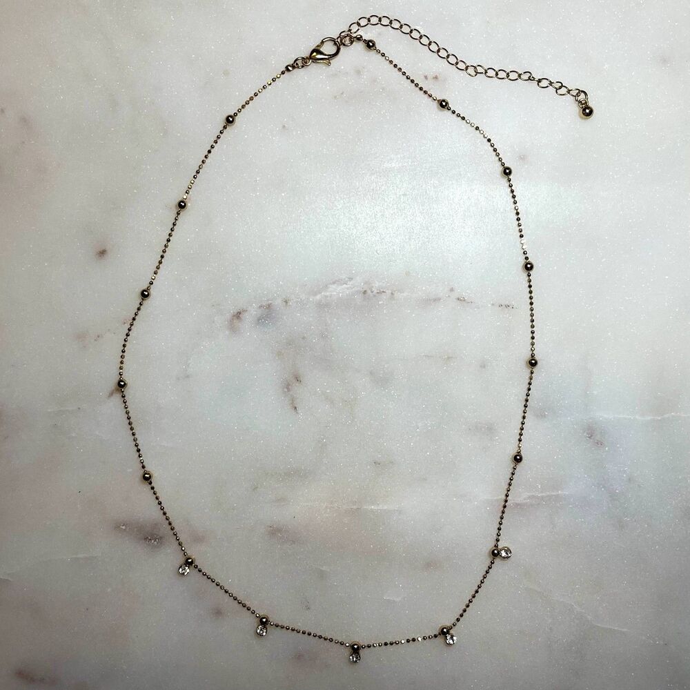 Gold Tone Station Necklace with Clear Crystals
